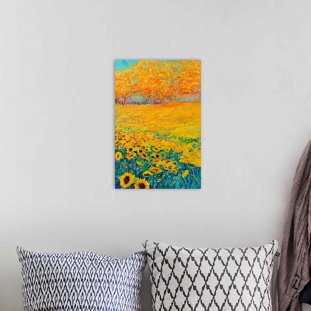A bohemian room featuring Brightly colored triptych of a sunflower field. Panel 3 of 3.