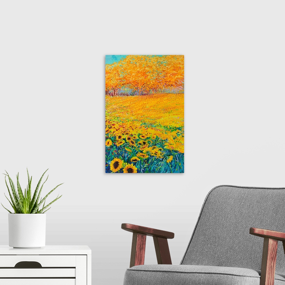 A modern room featuring Brightly colored triptych of a sunflower field. Panel 3 of 3.