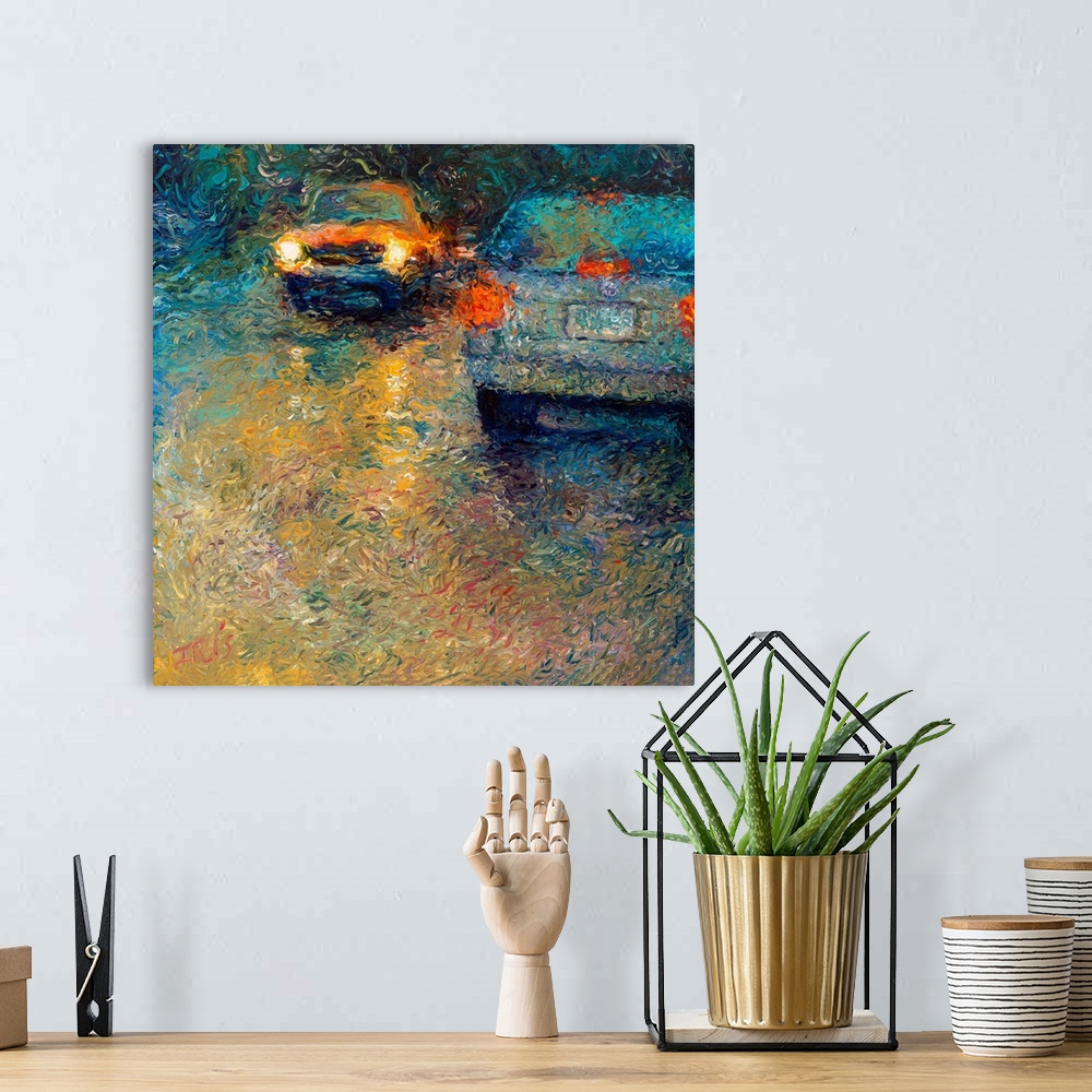 A bohemian room featuring Brightly colored contemporary artwork of a blue and a yellow car passing each other.
