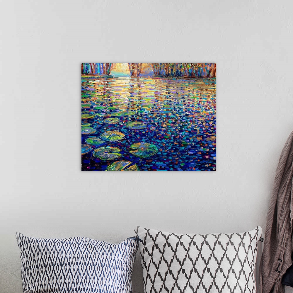 A bohemian room featuring Brightly colored contemporary artwork of a pond covered in water lilies.