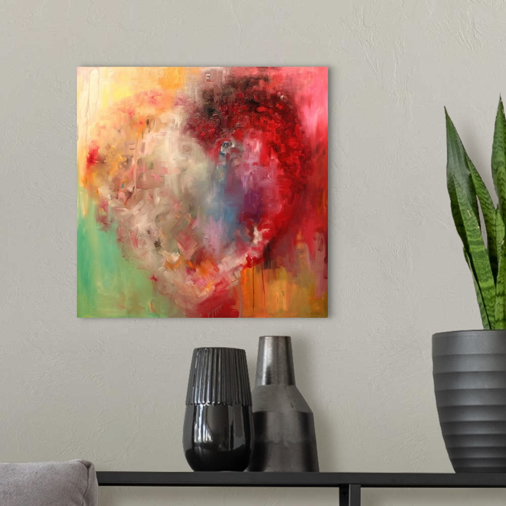 A modern room featuring Abstract painting in red and yellow, with a vague heart shape.