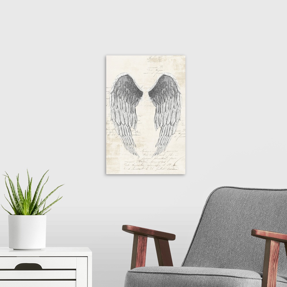 A modern room featuring A vertical drawing of a pain of angel wings with metallic sliver accents on a neutral backdrop wi...