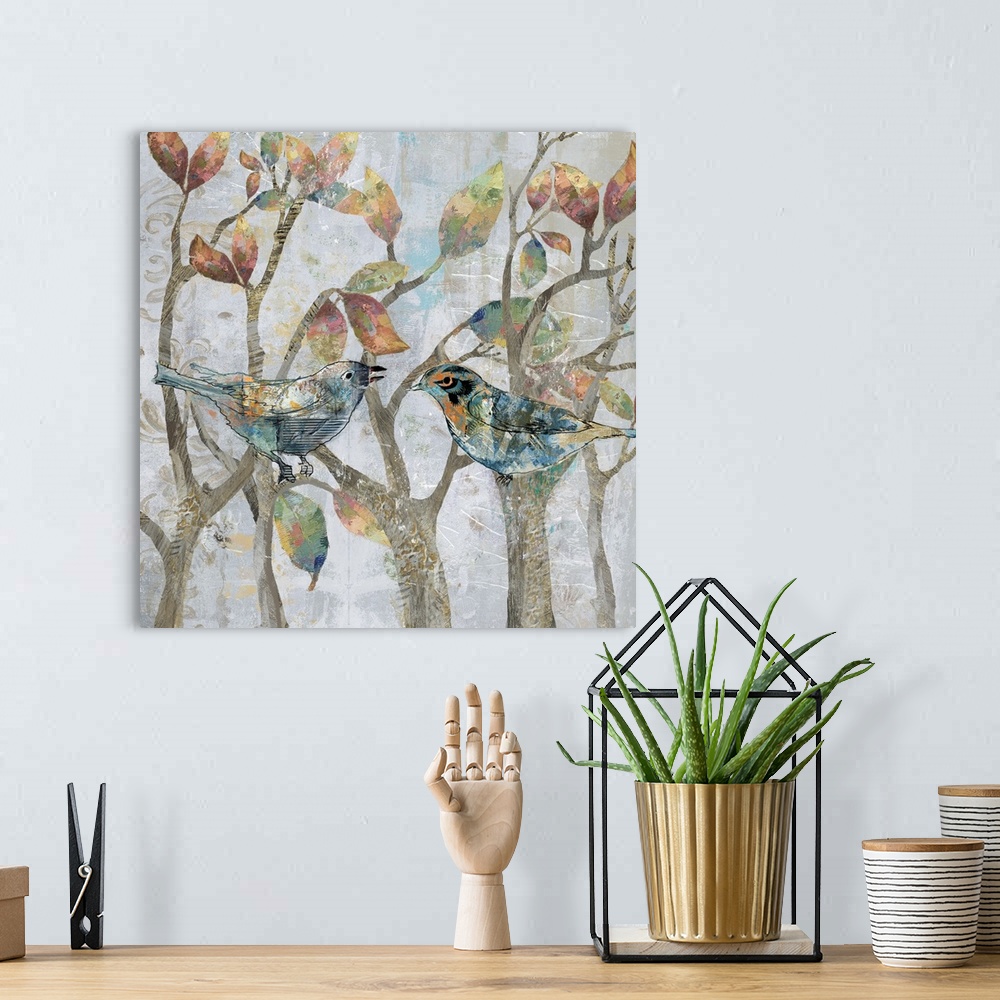 A bohemian room featuring A mixed media painting of two birds perched on tree limbs with hints of gold accents.
