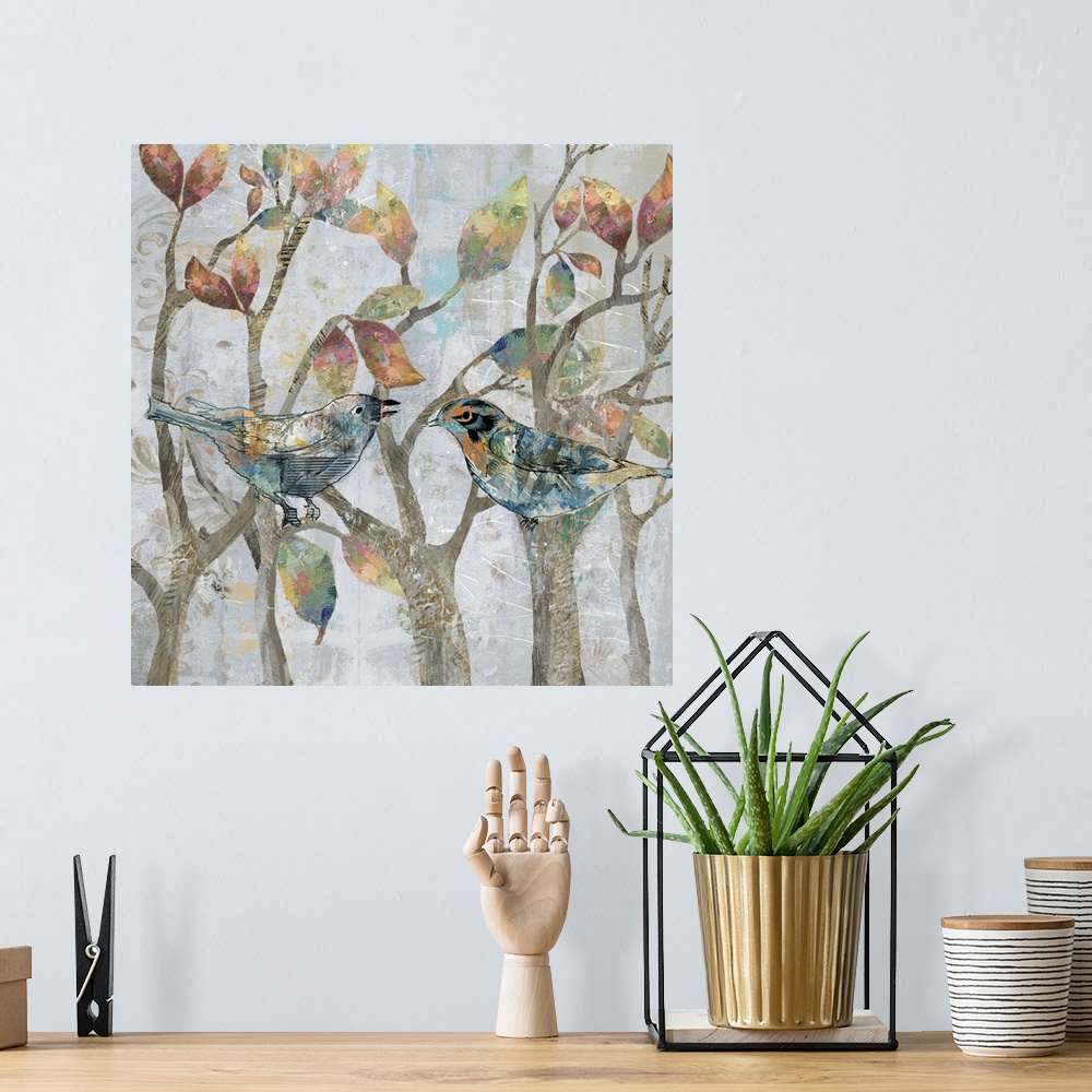 A bohemian room featuring A mixed media painting of two birds perched on tree limbs with hints of gold accents.