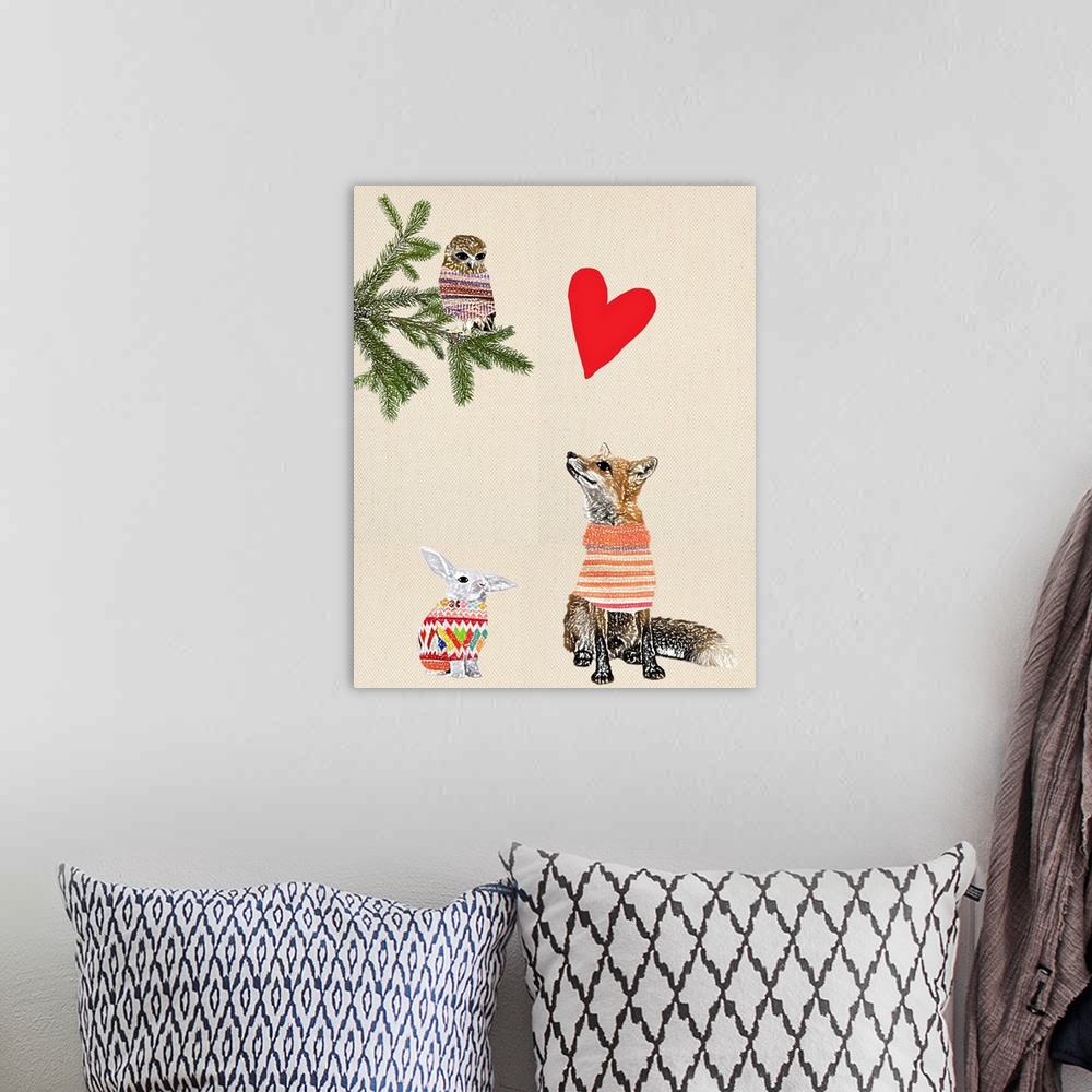A bohemian room featuring Illustration of a fox, rabbit and owl wearing sweaters, and a red heart above on a linen background.