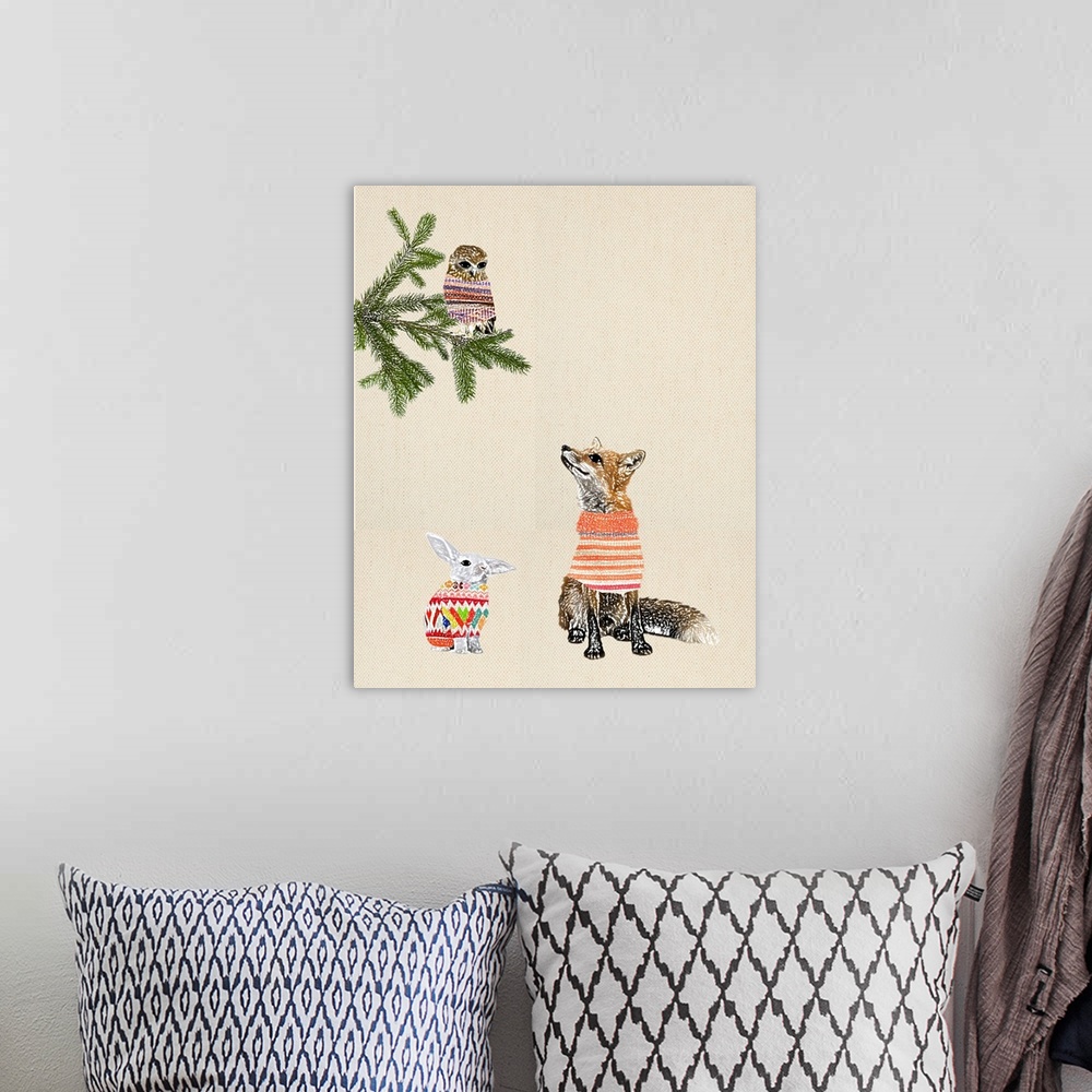A bohemian room featuring Illustration of a fox, rabbit and owl wearing sweaters on a linen background.