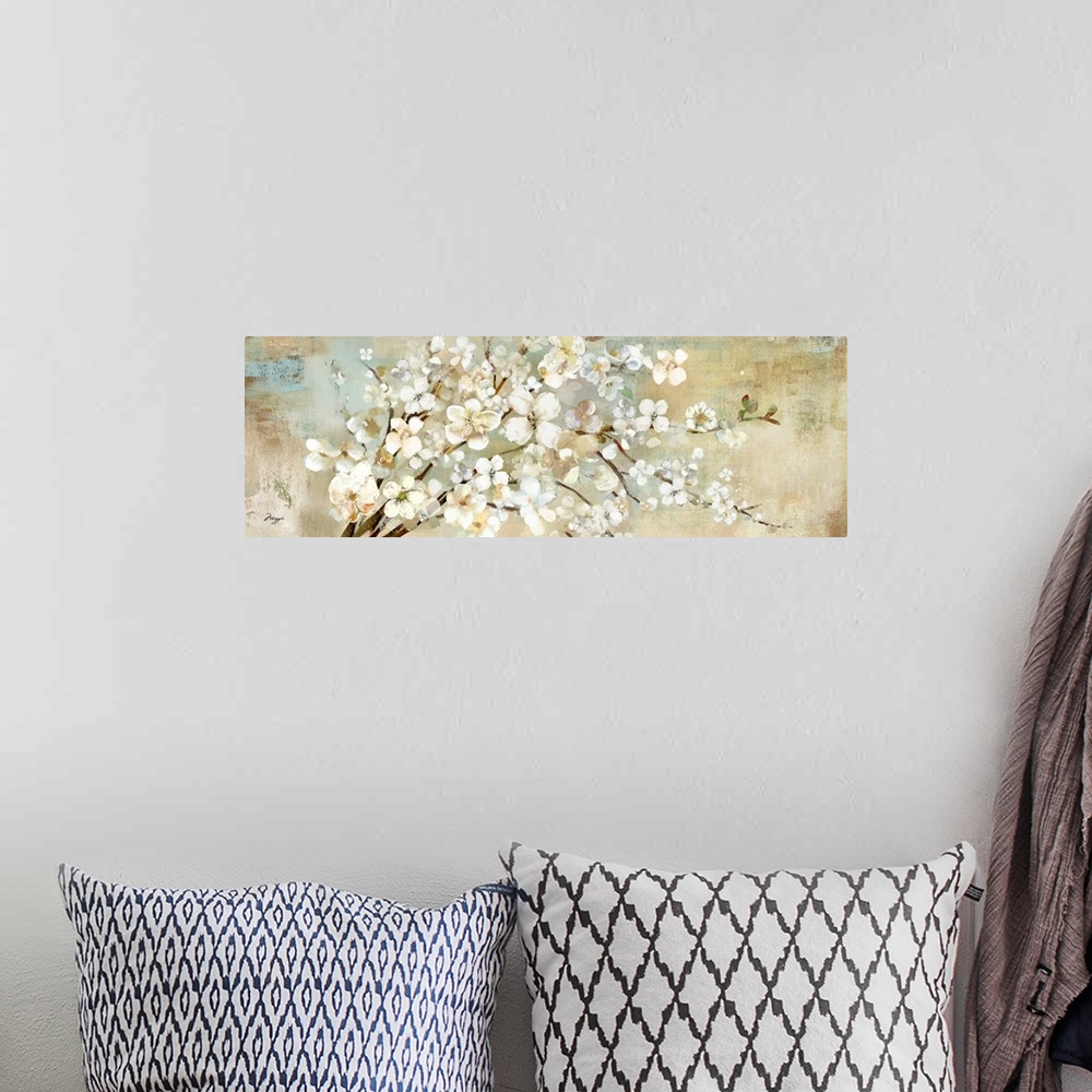 A bohemian room featuring A panoramic painting of a branch of white blossoms against a neutral backdrop.