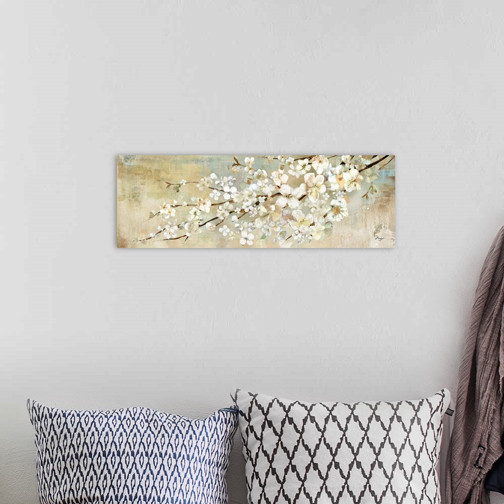A bohemian room featuring A panoramic painting of a branch of white blossoms against a neutral backdrop.