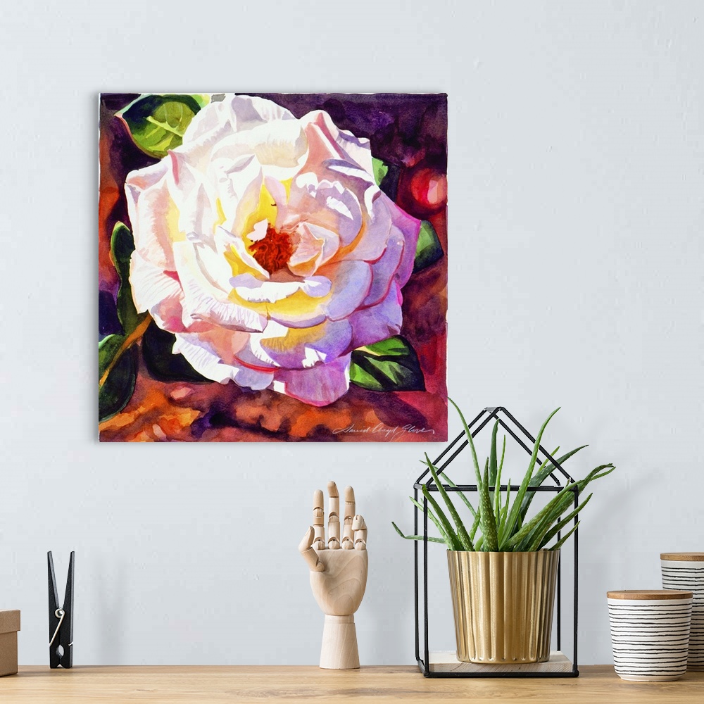 A bohemian room featuring Painting of a rose with light shining on its petals.