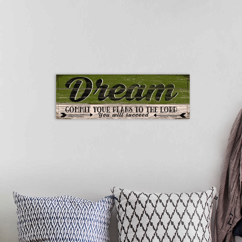 A bohemian room featuring Weathered sign that reads "Dream - Commit your plans to the Lord; you will succeed."