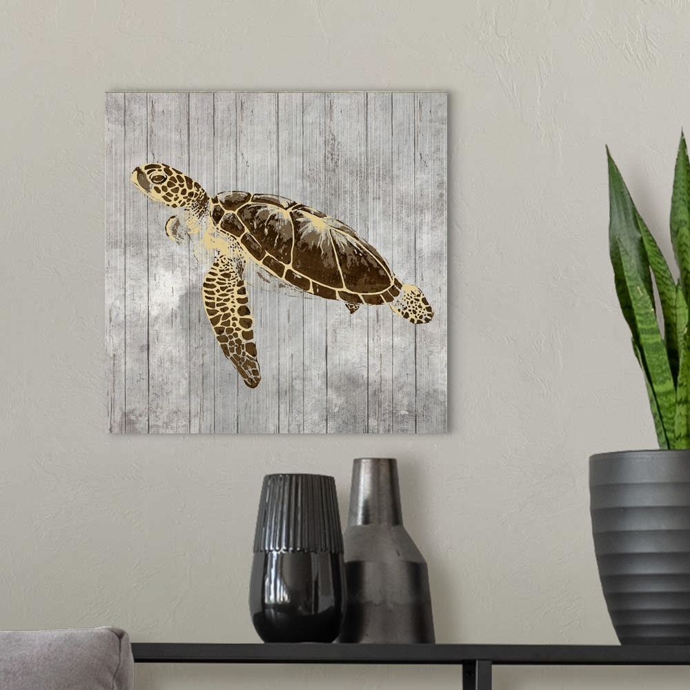 A modern room featuring A decorative image of a turtle with gold accents on a gray wood backdrop.