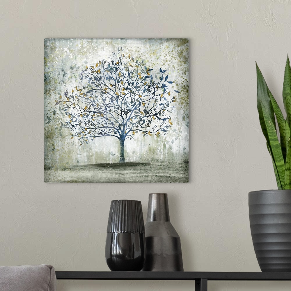 A modern room featuring A decorative image of a blue tree with accents of gold leaves with a distressed overlay.