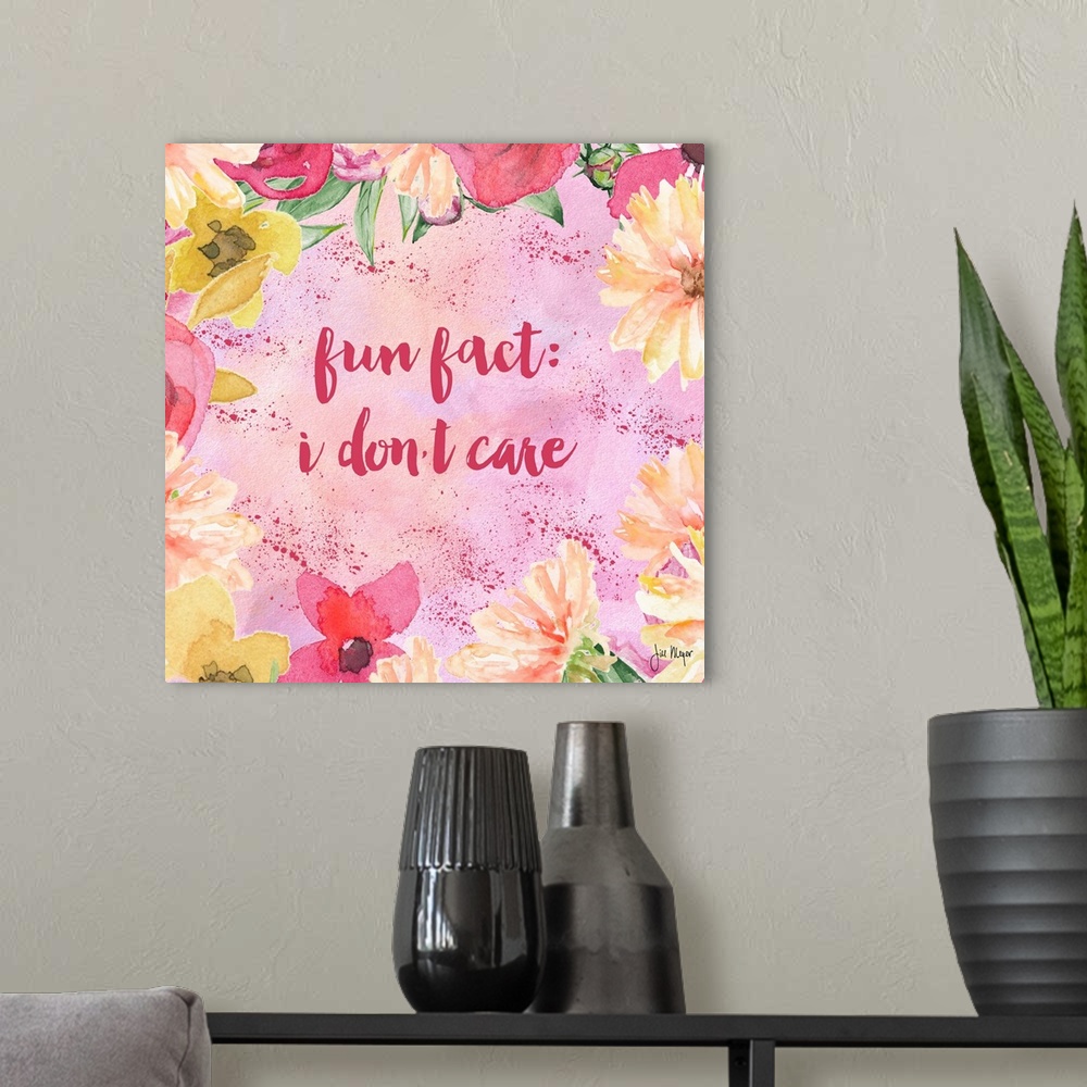 A modern room featuring Cheeky hand-lettered text reading "Fun fact: I don't care" framed by watercolor flowers.