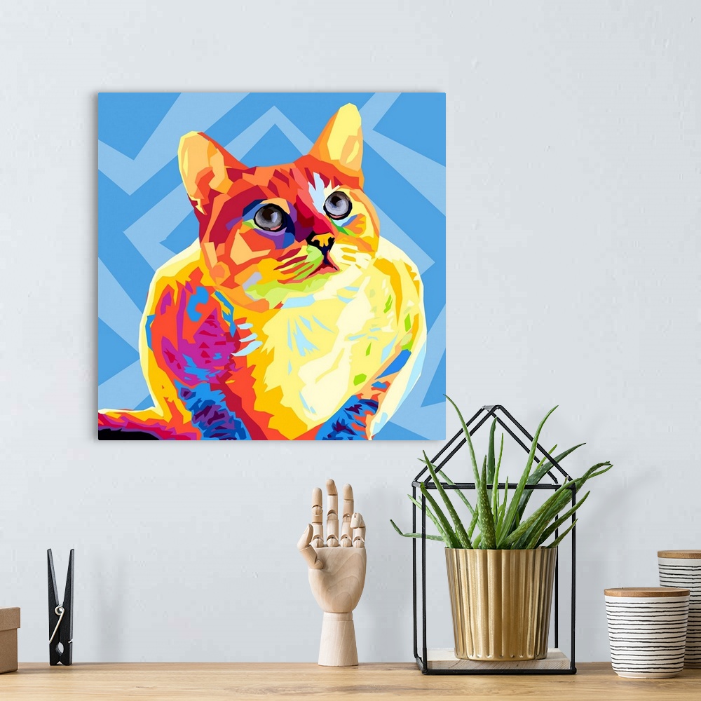 A bohemian room featuring A modern graphic design of a multi-colored cat on a geometric blue background.