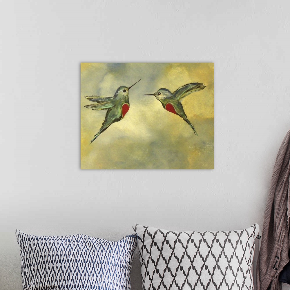 A bohemian room featuring Two hummingbirds with heart shapes on their bellies.