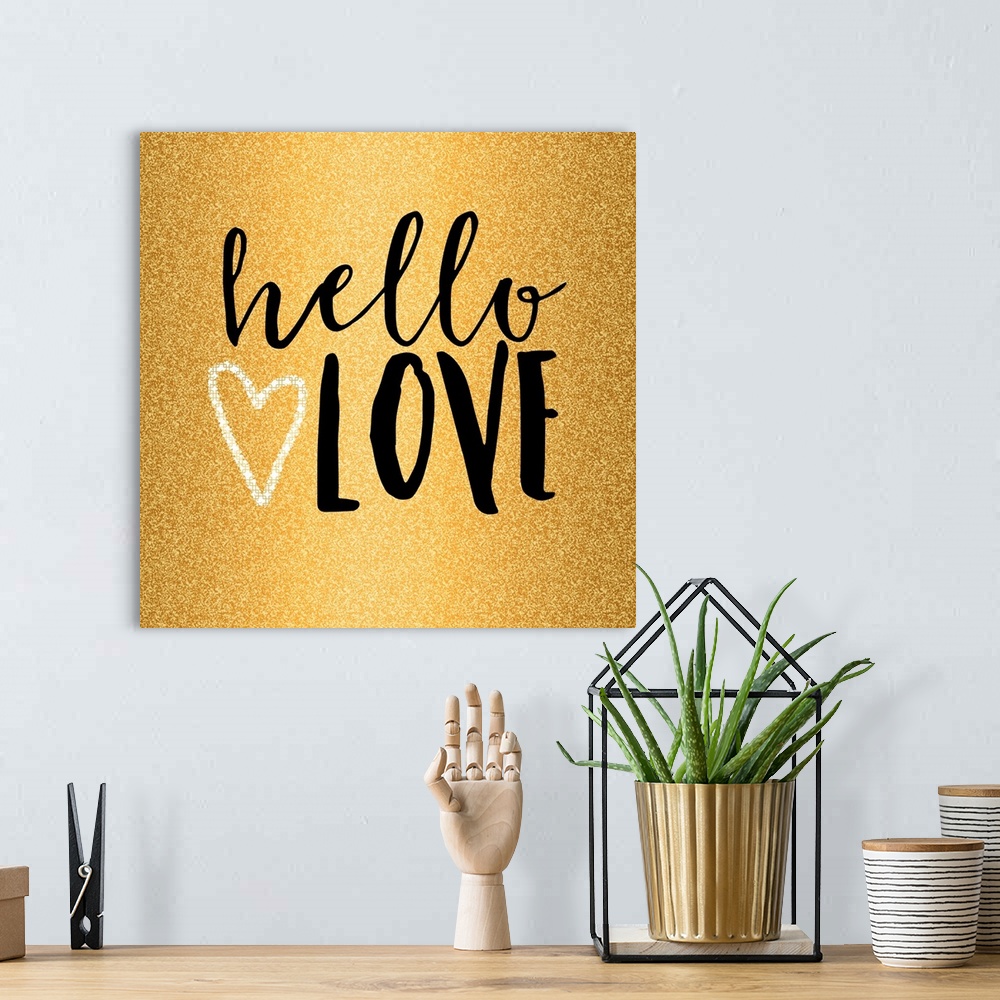 A bohemian room featuring Black text and a heart design on gold.
