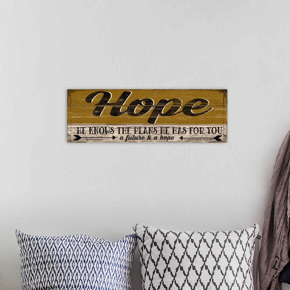 A bohemian room featuring Weathered sign that reads "Hope - He knows the plans He has for you; a future and a hope."