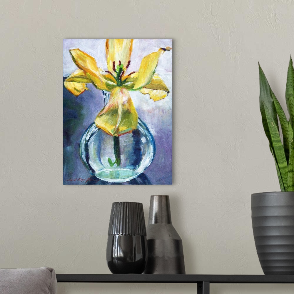 A modern room featuring Cut lily flower in glass vase still life.