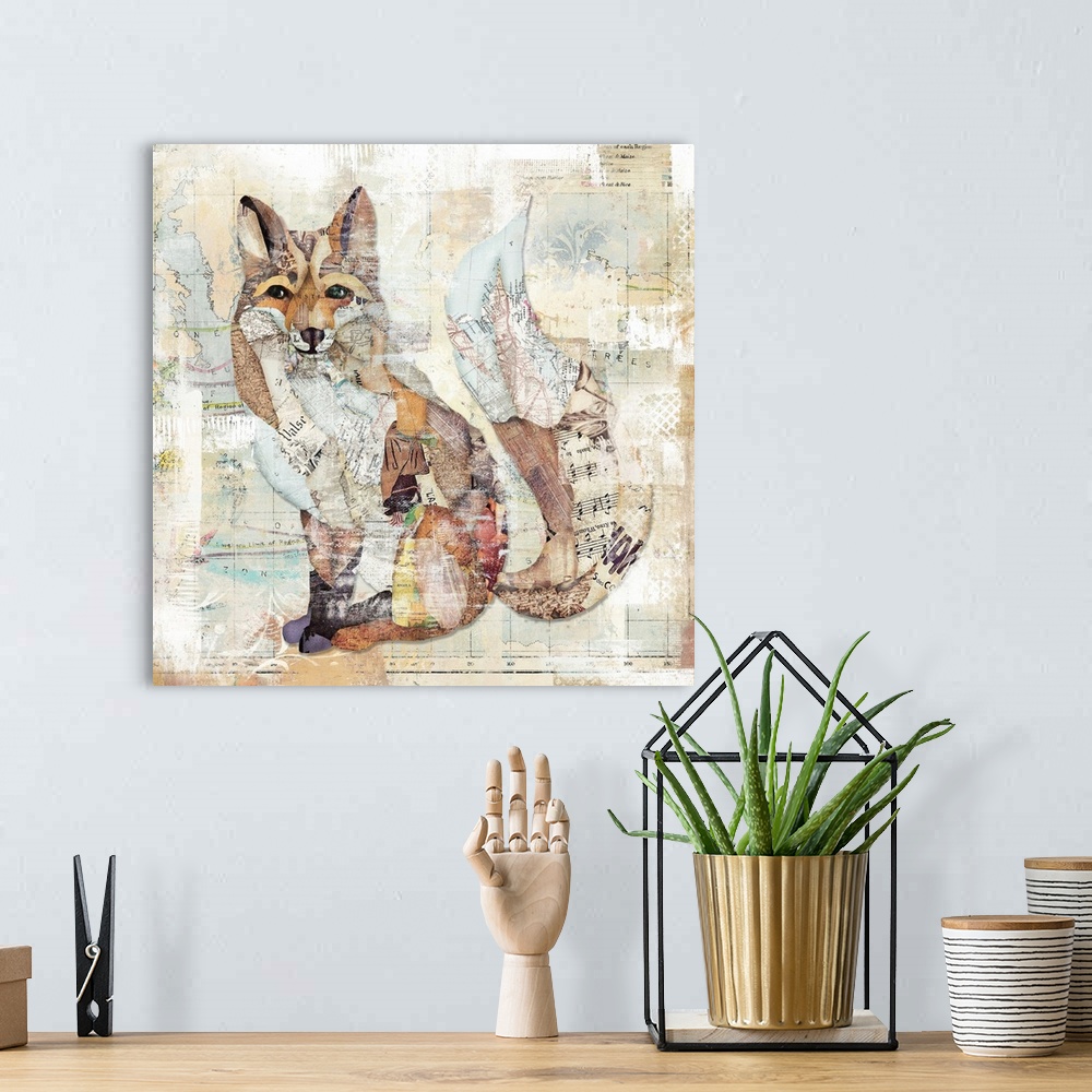 A bohemian room featuring A mixed media painting of a fox with hints of printed text and a faded map background.