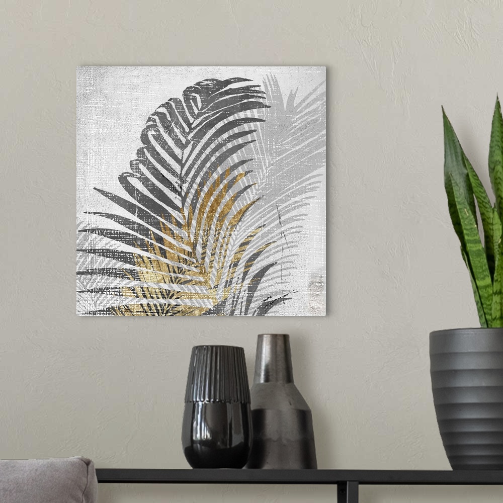 A modern room featuring A square artistic image of a gold and gray fern leaves with a fade leaf in the background with wh...