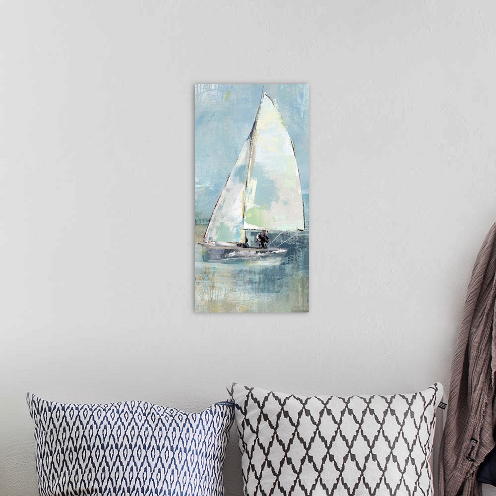 A bohemian room featuring A long vertical painting of sailboats with patches of multiple colors in muted tones.