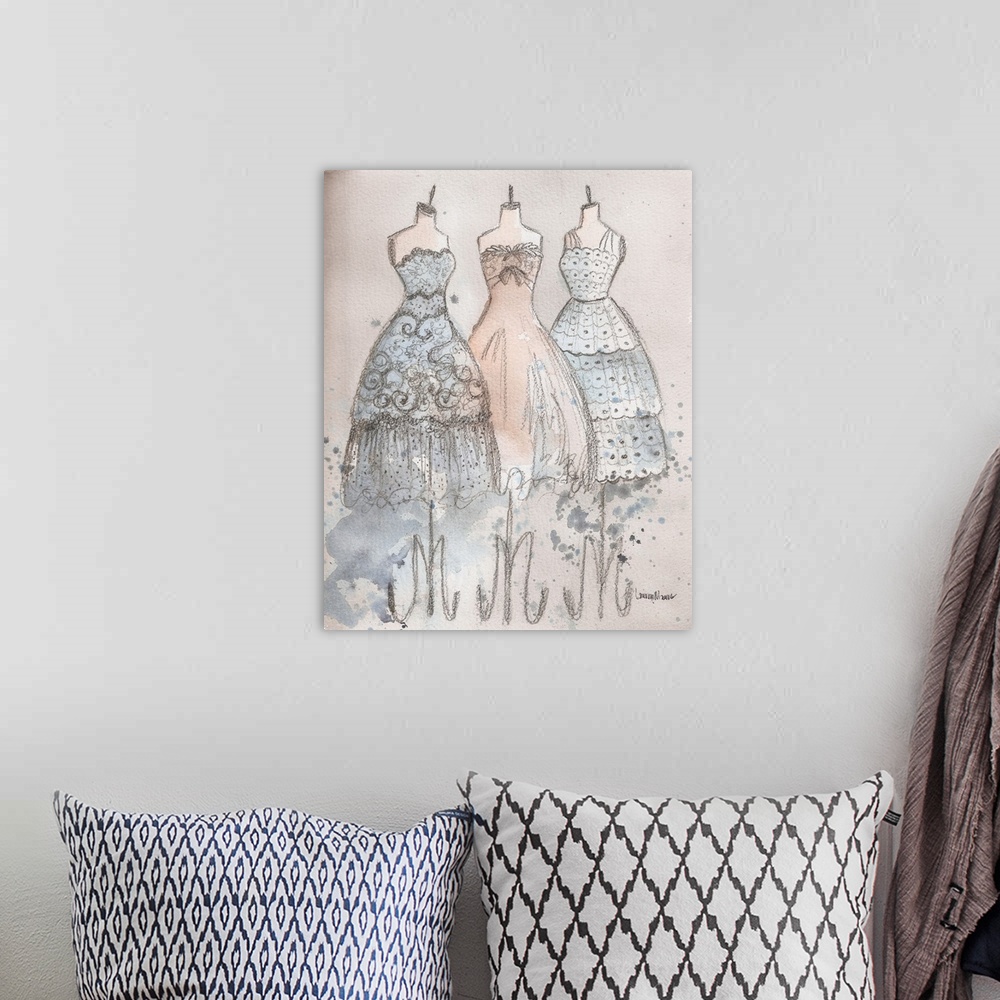 A bohemian room featuring Watercolor painting of three elegant gowns with lots of lace and details.