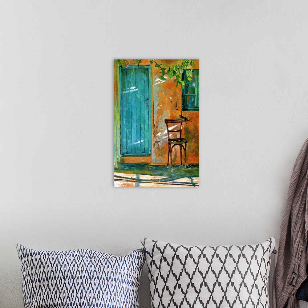 A bohemian room featuring Contemporary artwork of an old chair next to a blue door in Corfu.