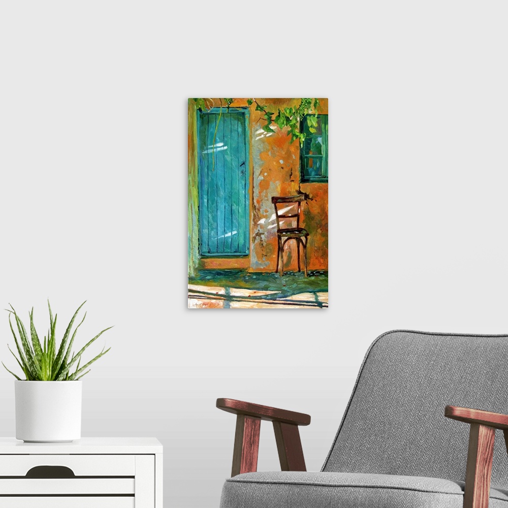 A modern room featuring Contemporary artwork of an old chair next to a blue door in Corfu.