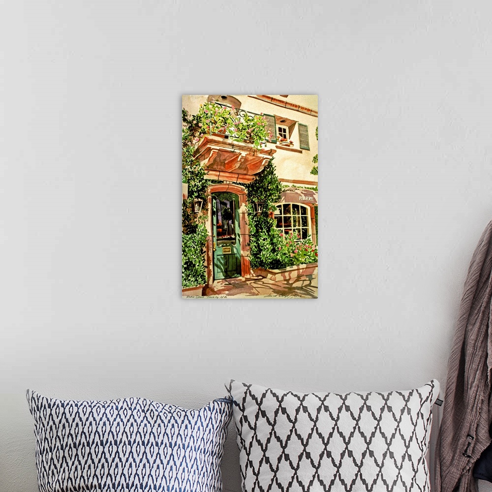A bohemian room featuring Watercolor painting of a doorway and window covered in vines in a European village.