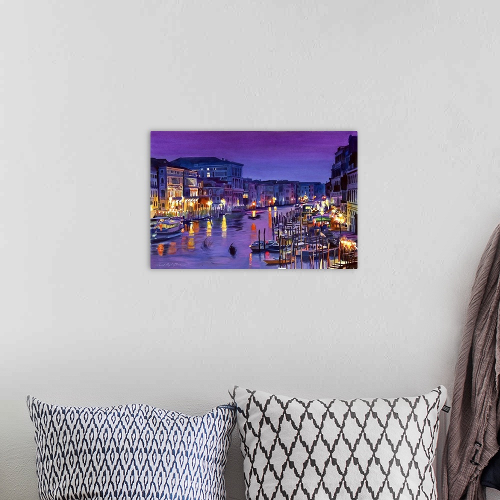 A bohemian room featuring Contemporary painting of boats in the Venice canals, illuminated at night.