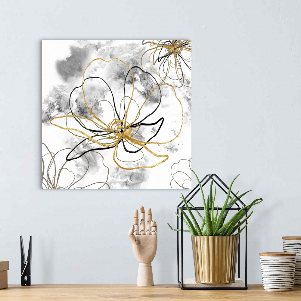 A bohemian room featuring Decorative artwork of outlined flowers in black and gold with gray blurred spots on a white backg...