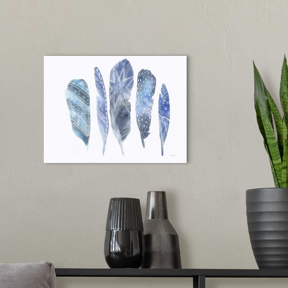 A modern room featuring Watercolor artwork of five blue feathers with white patterns.