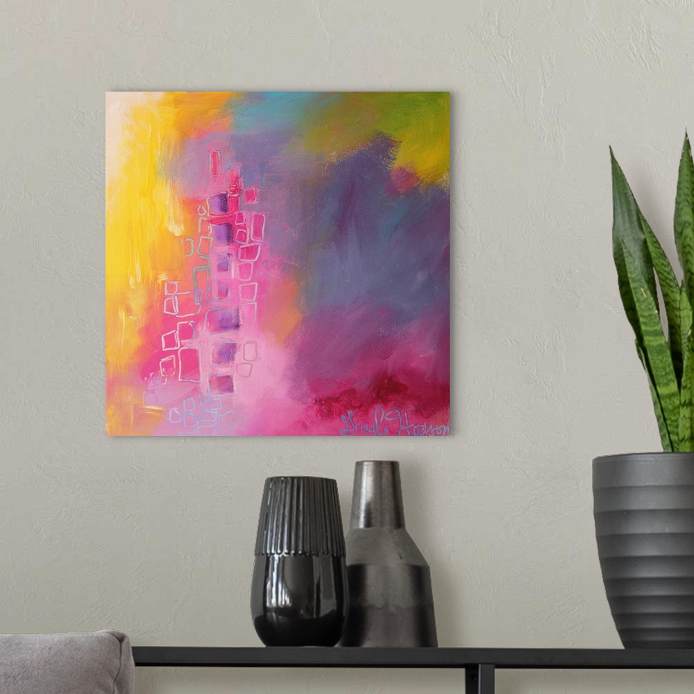 A modern room featuring Cheerful abstract painting in pink, purple, and yellow, with organic square shapes.