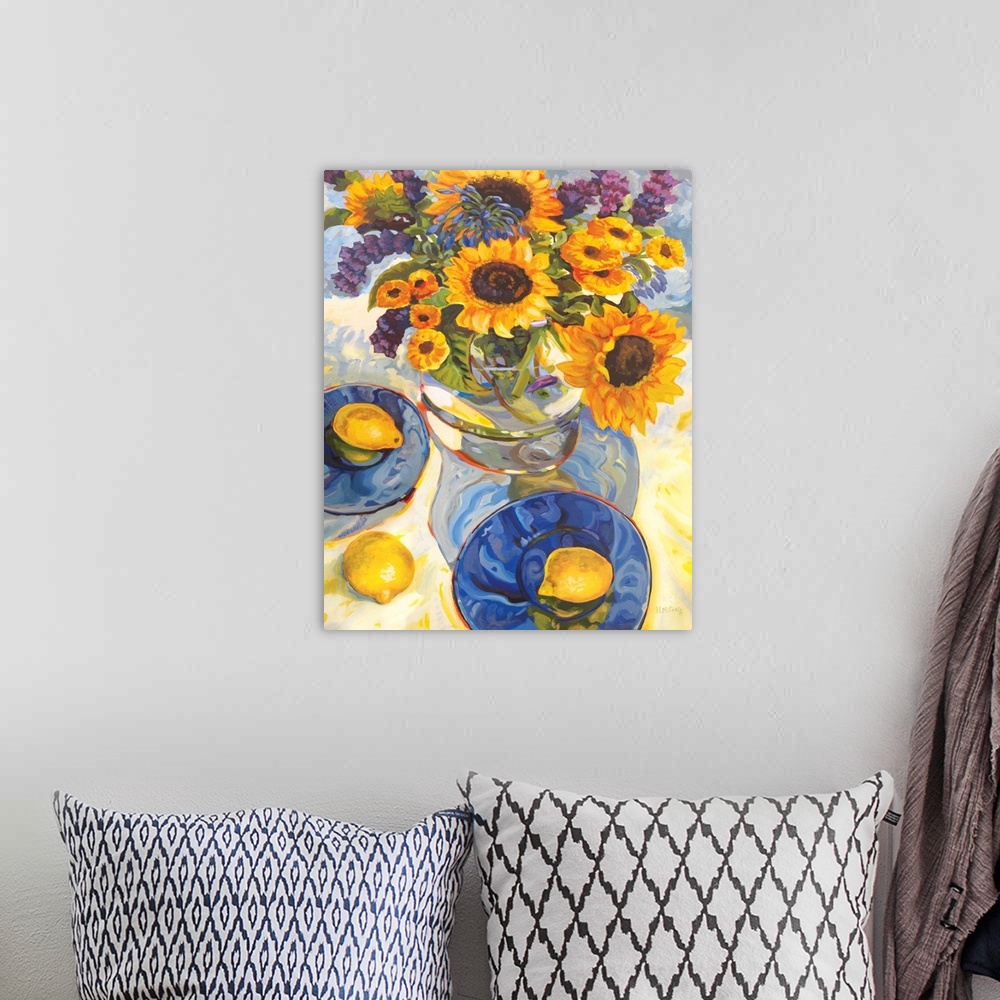A bohemian room featuring Contemporary artwork of a bouquet of sunflowers in a vase.