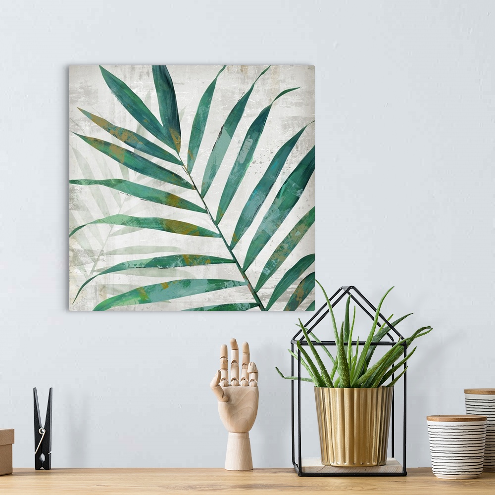 A bohemian room featuring A square artistic image of a blue and green fern leaf with a fade leaf in the background with spa...