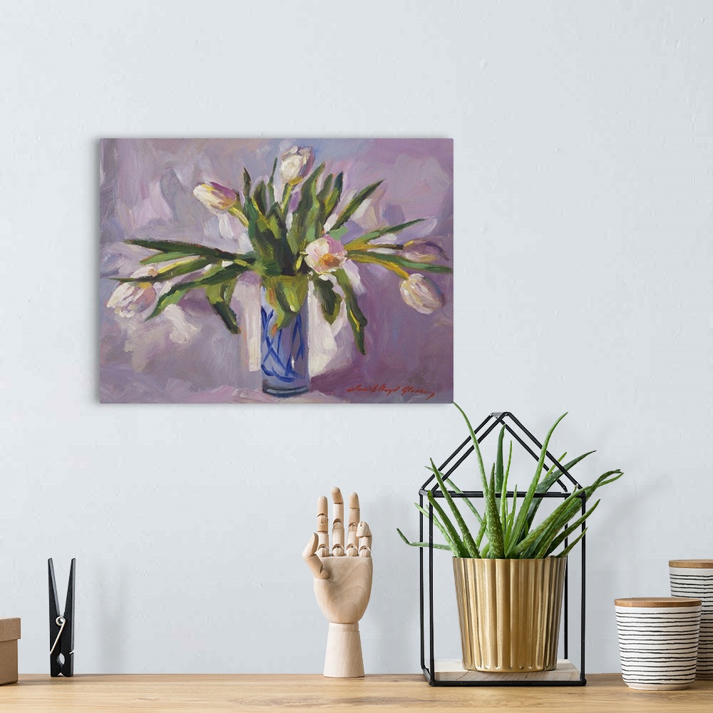 A bohemian room featuring Contemporary painting of a blue vase full of long-stemmed tulips.