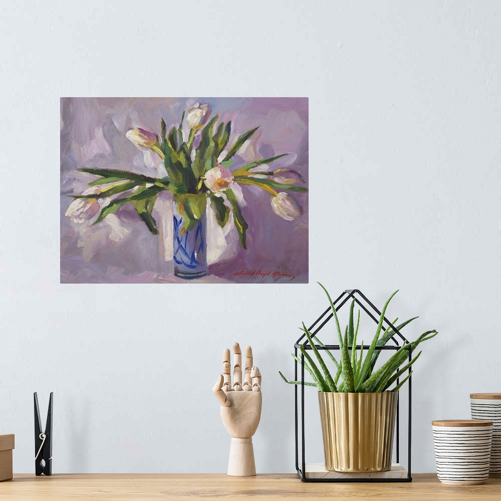 A bohemian room featuring Contemporary painting of a blue vase full of long-stemmed tulips.