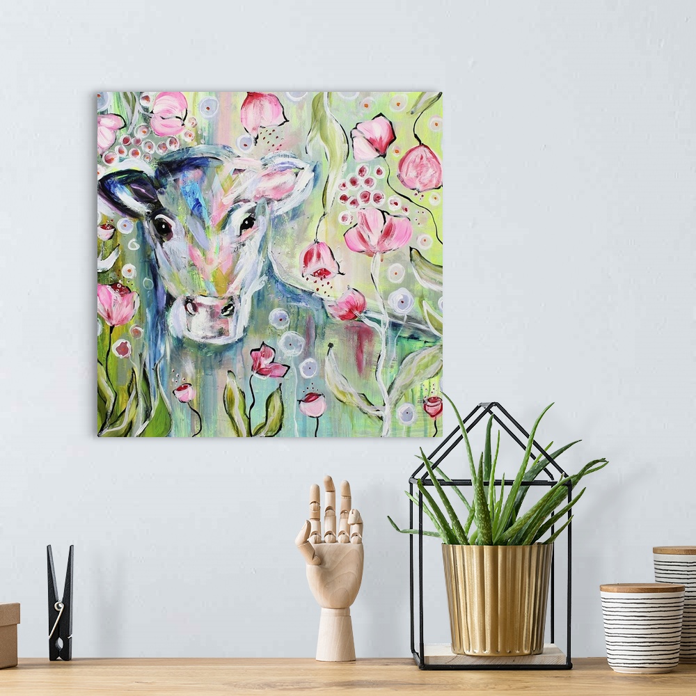 A bohemian room featuring Painting of a calf hiding among pink flowers.