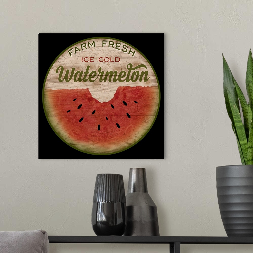 A modern room featuring Round wooden sign for fresh watermelon.