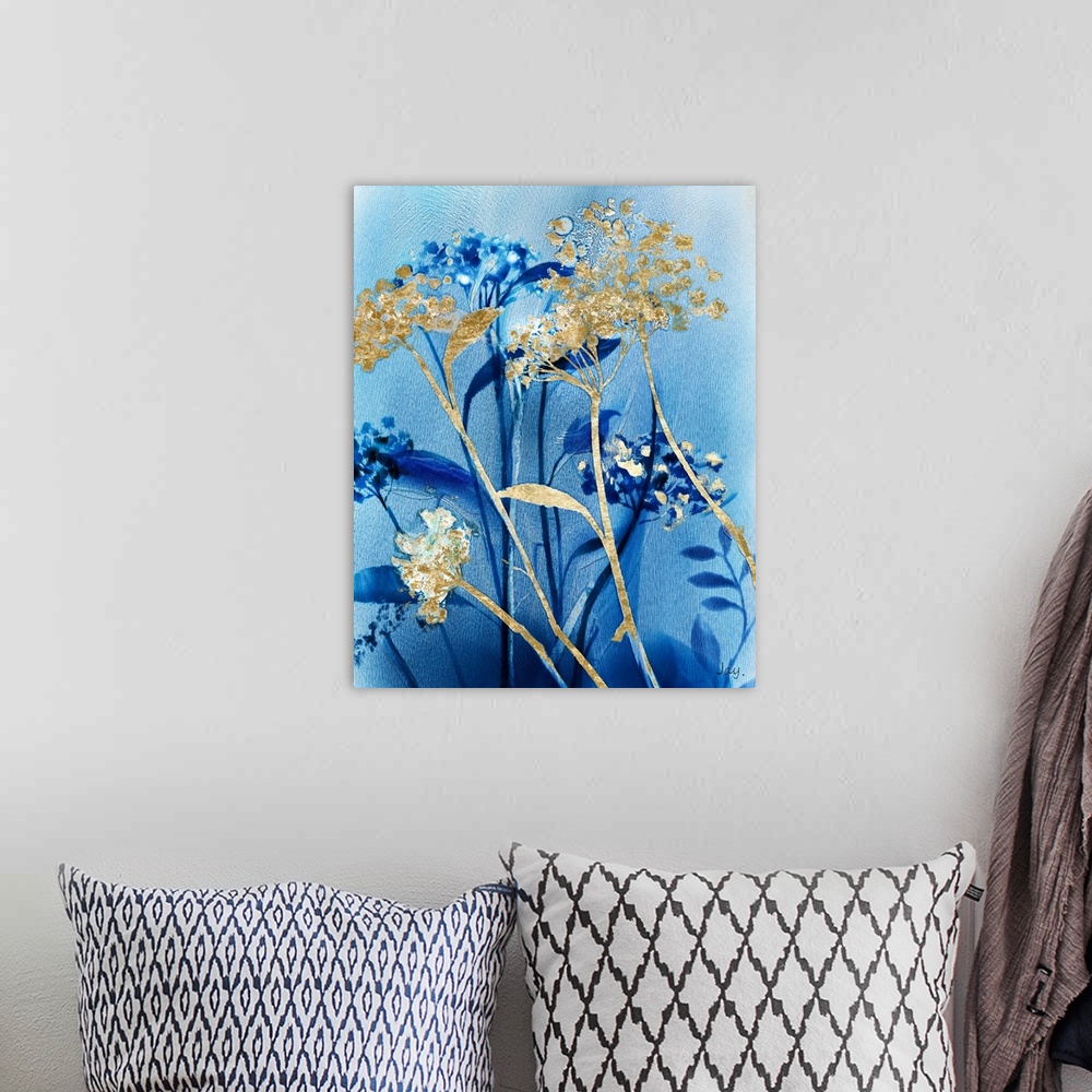 A bohemian room featuring A vertical artistic image of layered wild flowers in blue and metallic gold on fine lined brushed...