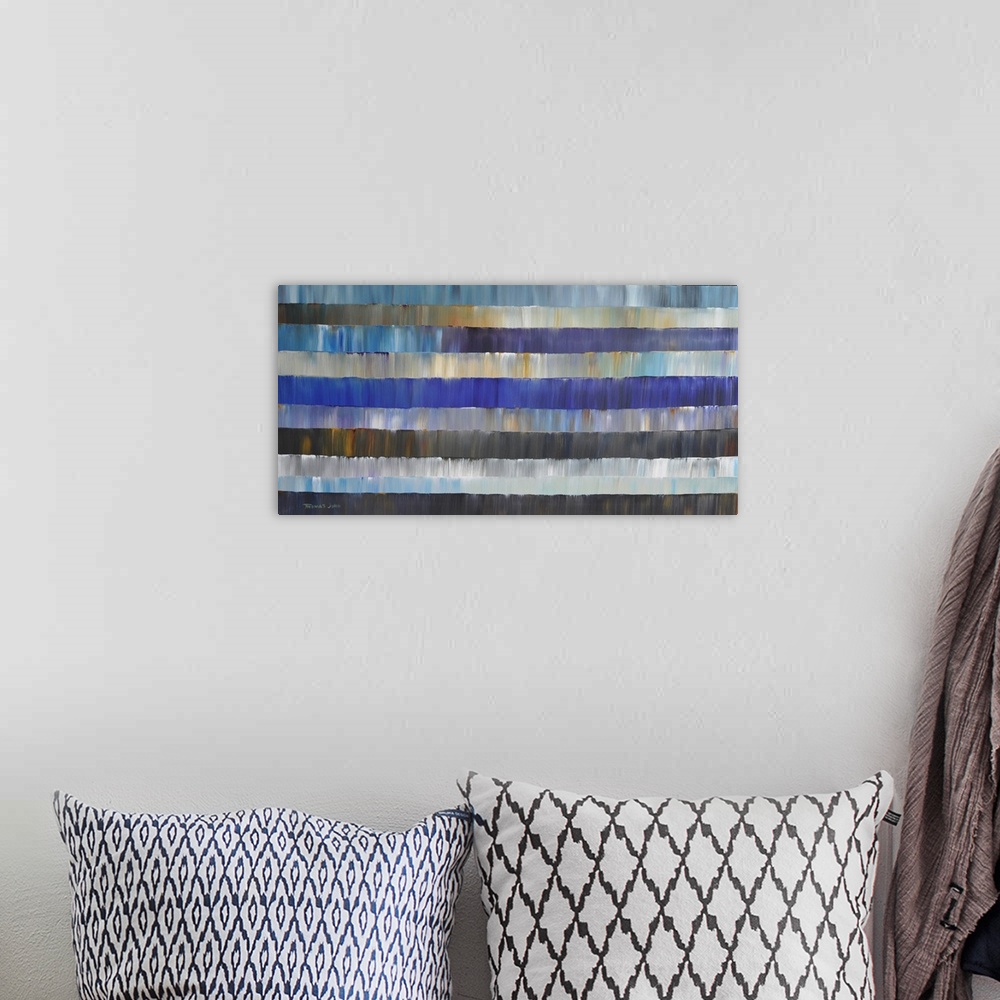 A bohemian room featuring Abstract painting in layers of blue and grey.