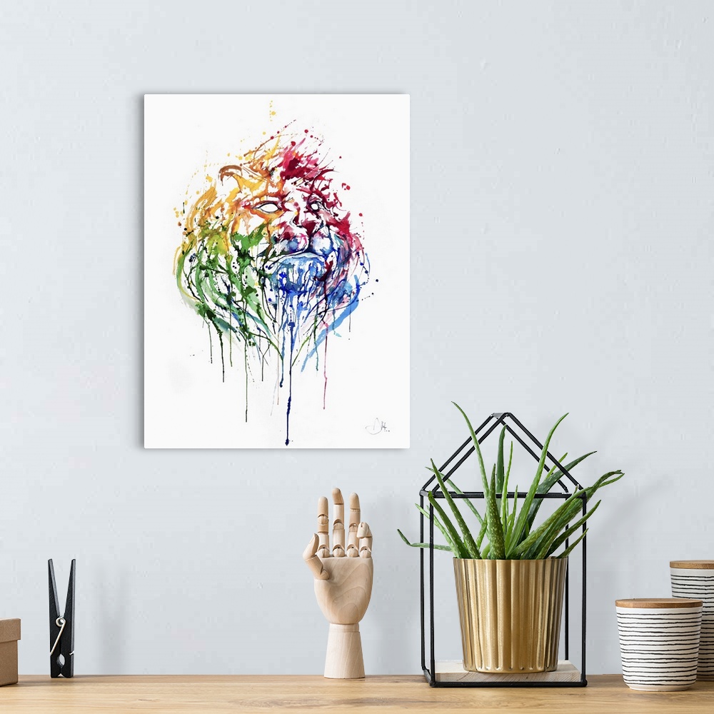A bohemian room featuring Watercolor and ink painting of a lion's face made of splashes of color.