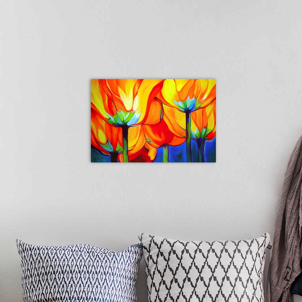 A bohemian room featuring Contemporary painting of vibrant yellow, red, and orange poppy flowers on blue background.