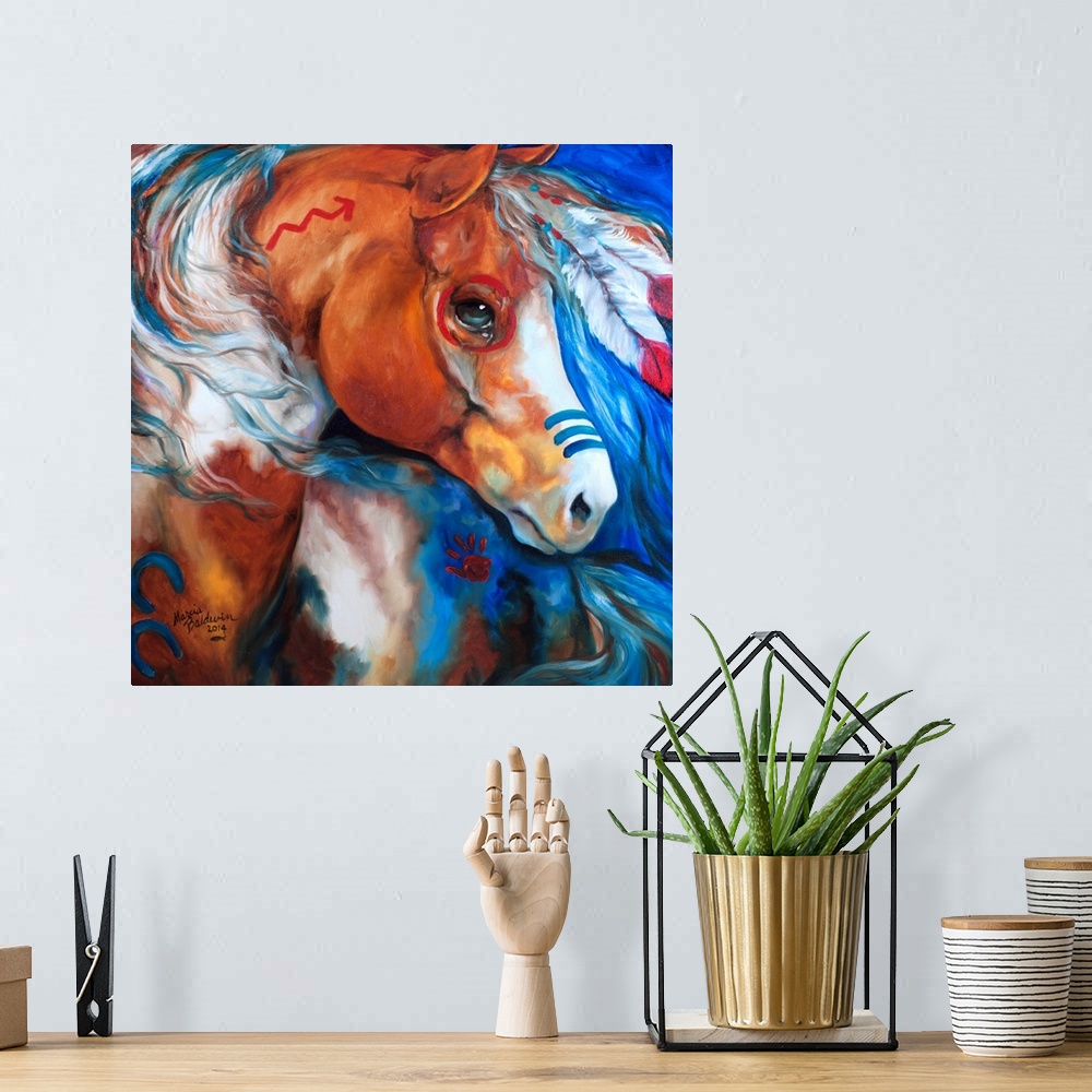A bohemian room featuring Square painting of a war horse dressed in war paint and feathers on a blue background.