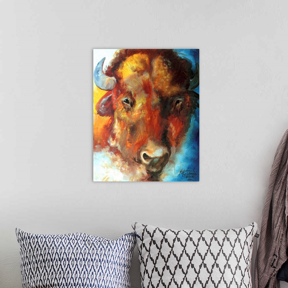 A bohemian room featuring Vertical painting of a buffalo's face with an abstract blue, yellow, and orange background, inspi...