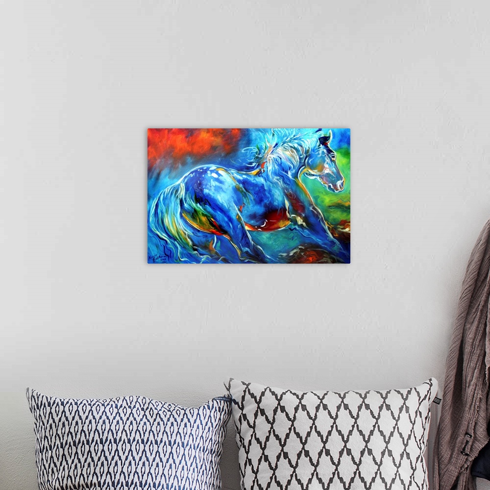 A bohemian room featuring Abstract painting of a blue wild stallion with red, yellow, and green hues mixed in.