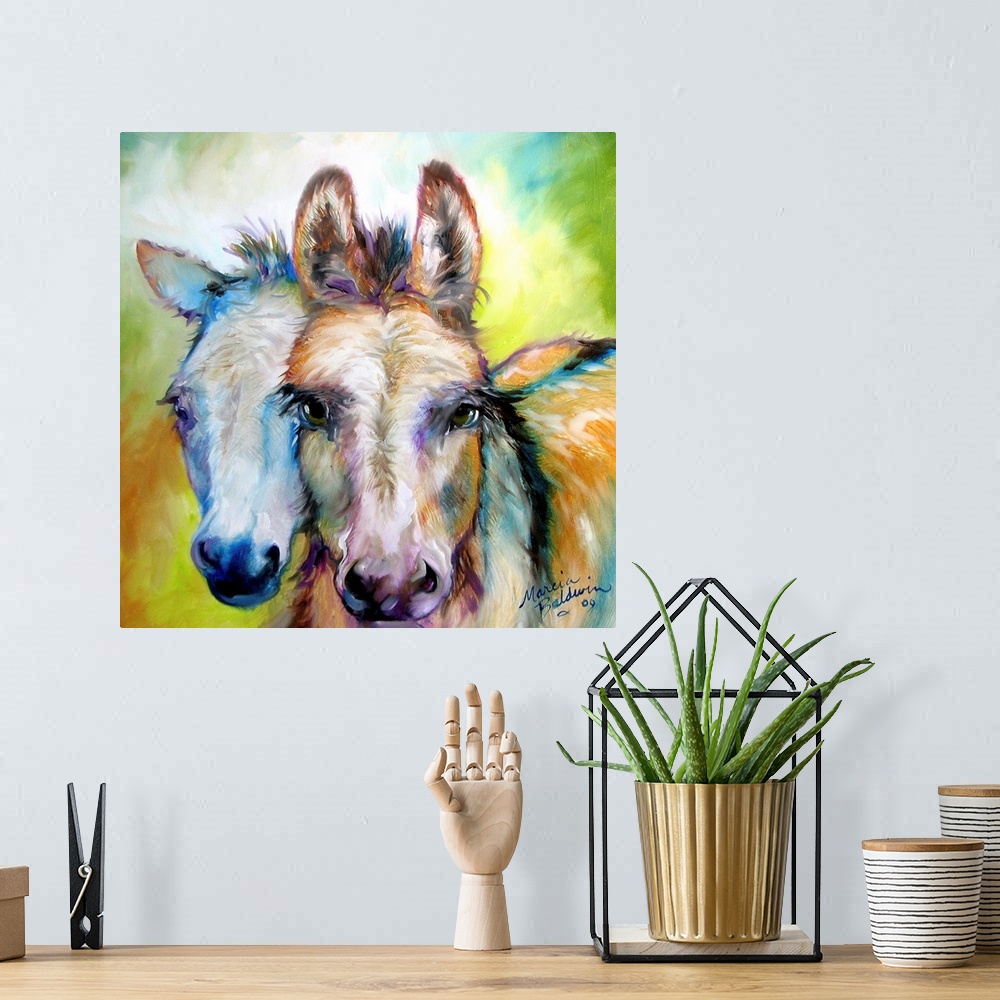 A bohemian room featuring Square painting of two donkeys with purple and blue highlights on a colorful background.