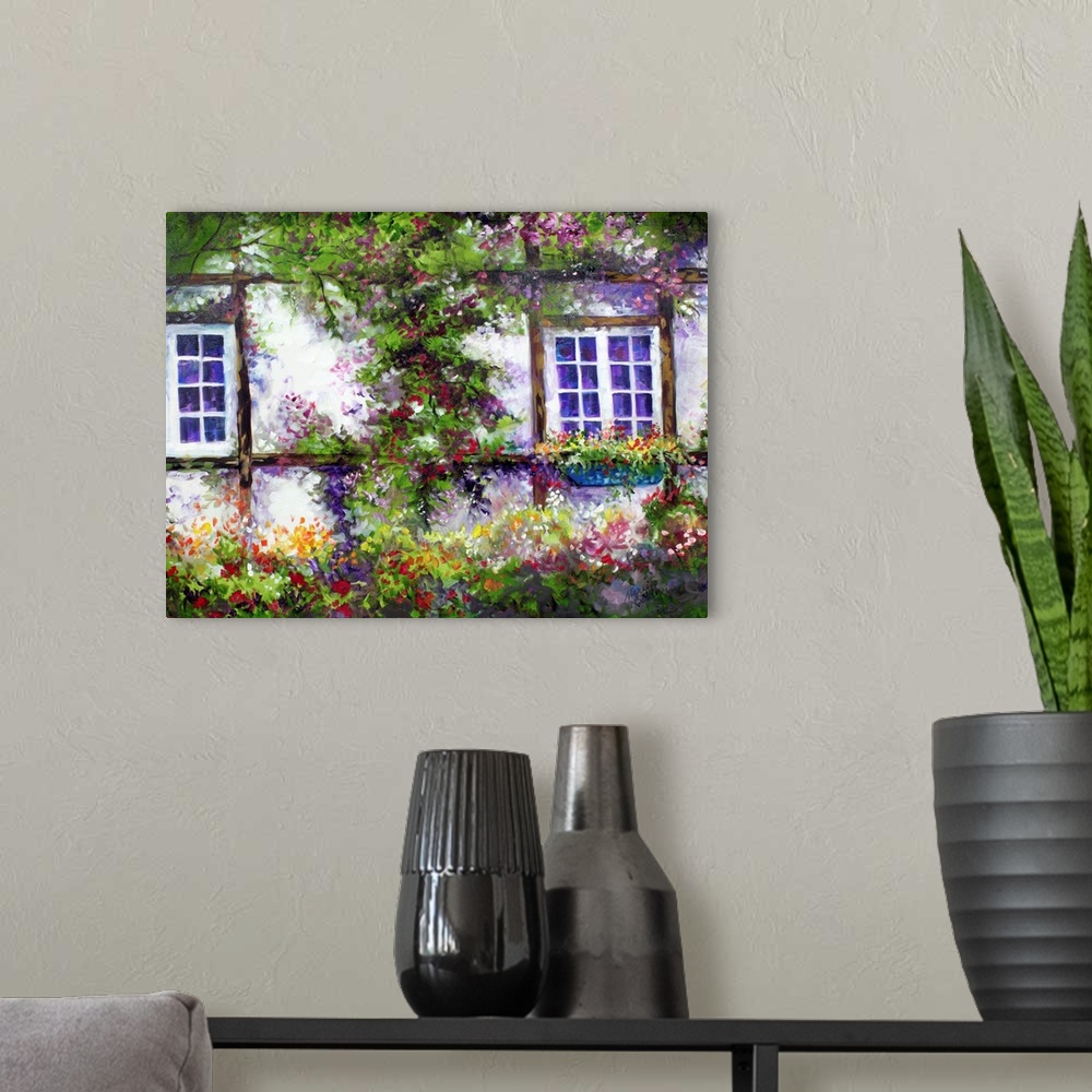 A modern room featuring Contemporary painting of an English cottage covered in flowers and greens.