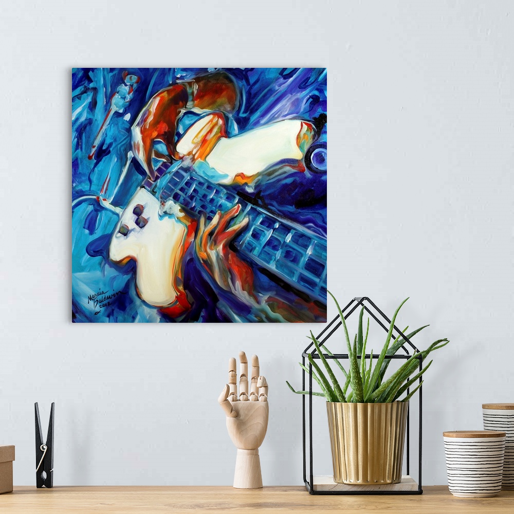 A bohemian room featuring Abstract painting of a guitarist from a unique point of view made with blue, red, and orange hues...