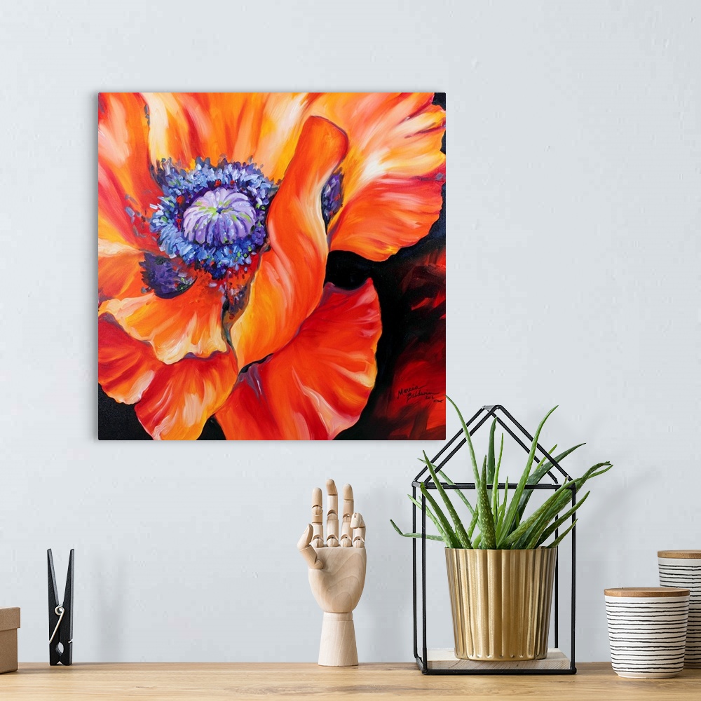 A bohemian room featuring A floral abstract of a red poppy on a square canvas.